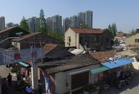 最后一塊“都市里的村莊”將消失,楊浦五角場鎮閘殷村舊改首日簽約達到生效比例