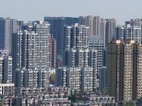 上海首家資產萬億房企誕生，外部形勢壓力尚在，資產規模為何還能做大？