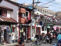 安置房源與周邊商品房價格持平，資金壓力大，上海舊改中這些“難啃的骨頭”如何解？