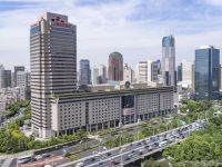 乘風破浪21載，延安西路高架邊這棟“龐然大物”，再次面對考驗